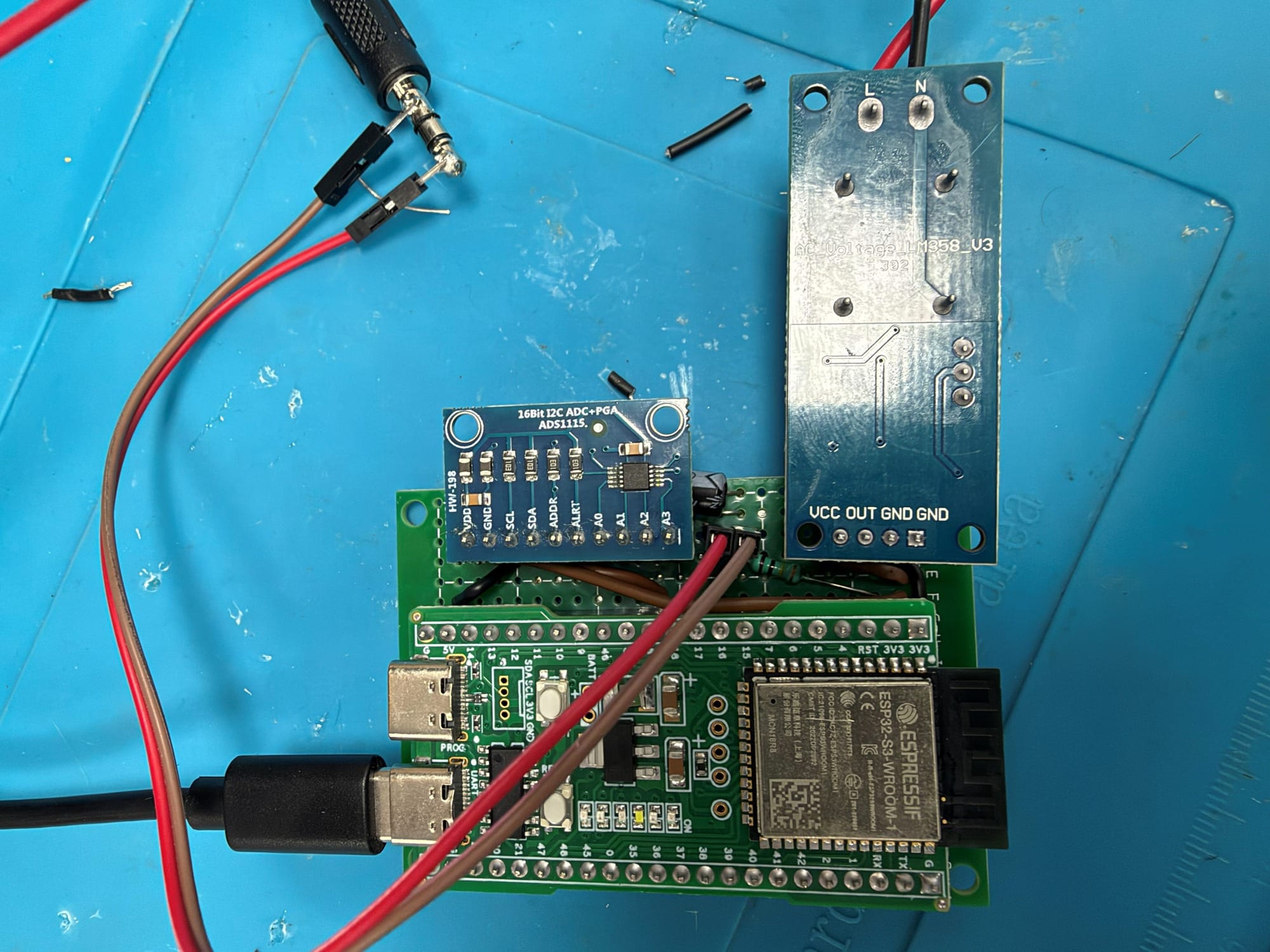 Photograph of the assembled prototype. The module marking reads ESP32-S2-WROOM.